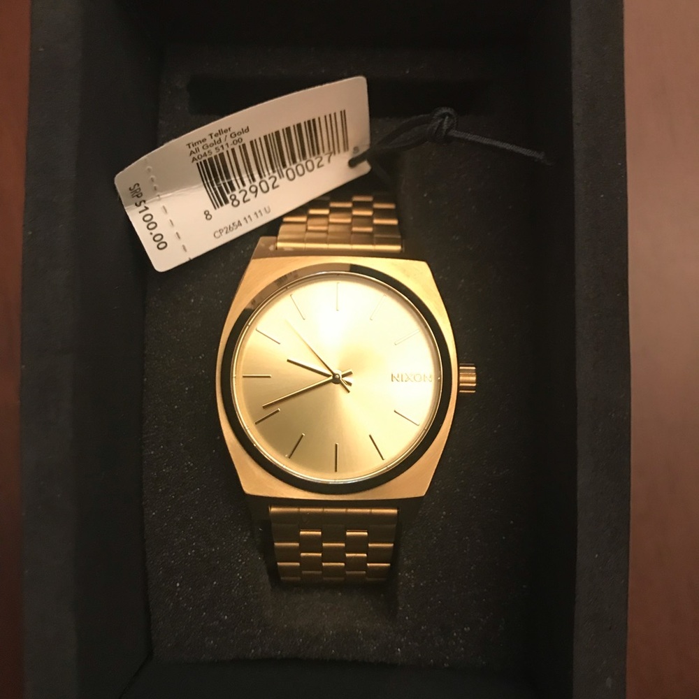 Nixon time teller gold/gold watch